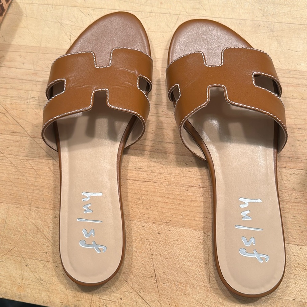 FS/NY Alibi Cognac Flat Sandals w/ White Stitching. Leather Upper, man made sole